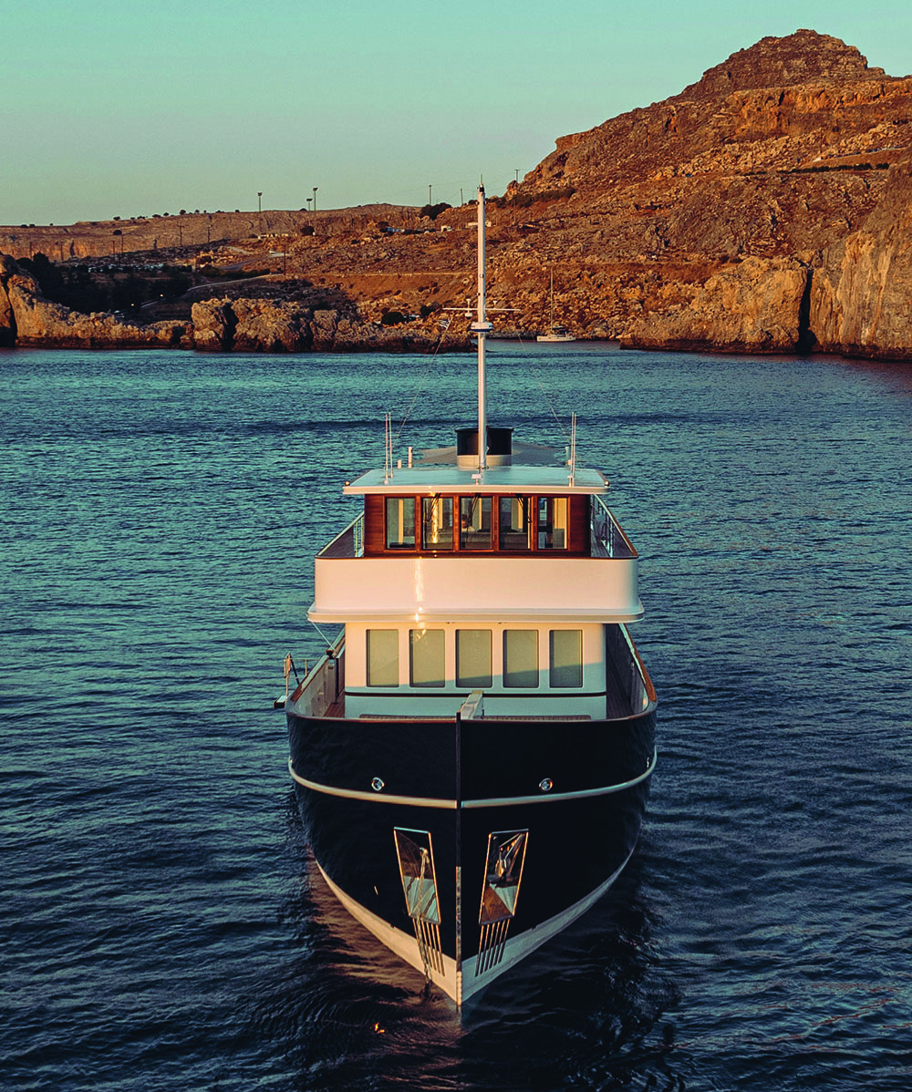 Front view of a boat at sunset