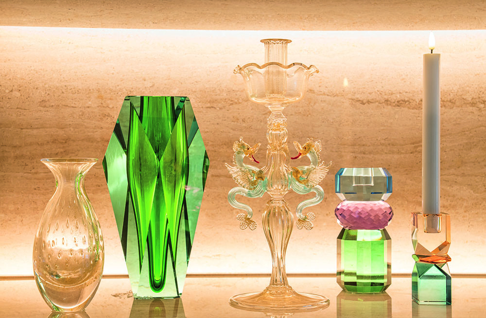Glass pieces of art in greens, pinks and peach