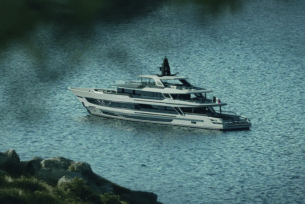 Side view of a boat on the water from afar