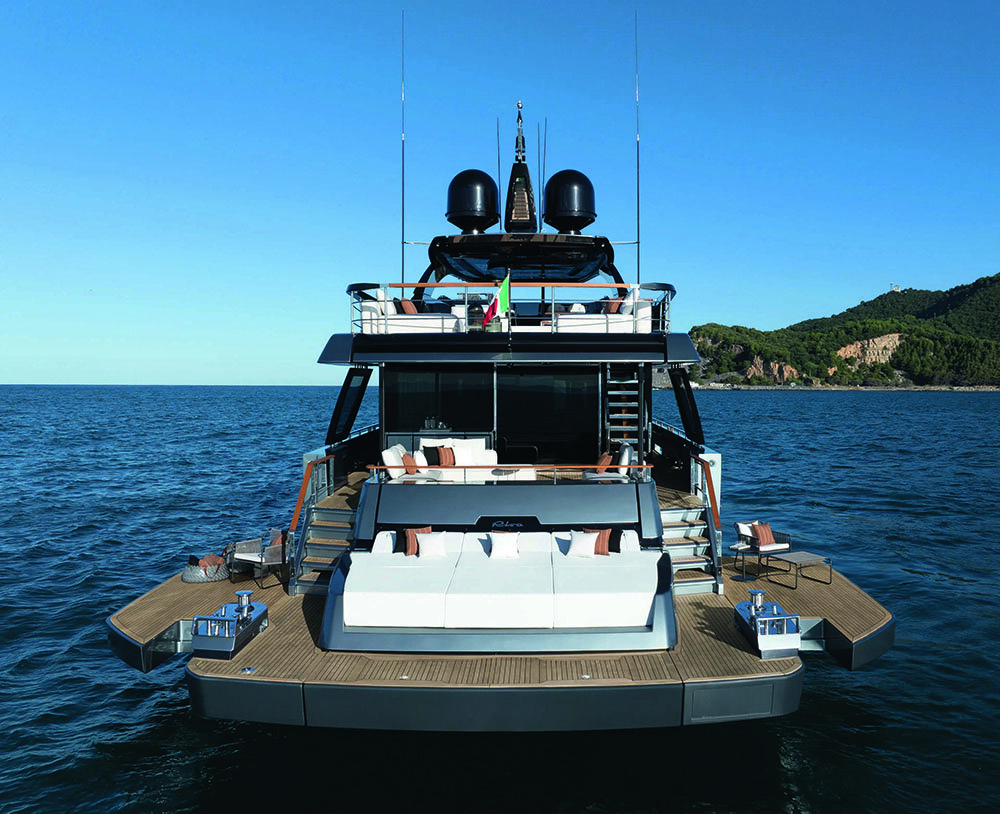 Back view of a boat showing a sunpad on a deck